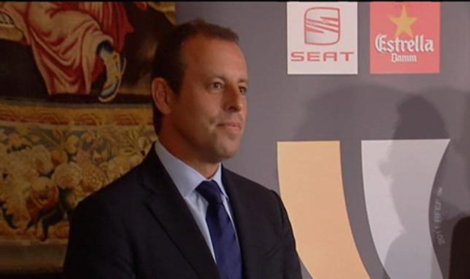 Florentino Pérez y Sandro Rosell posan con la Supercopa