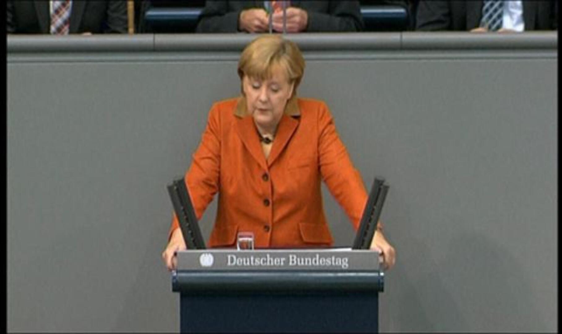 Merkel considera que es España quien debe decidir si pide el rescate o no 